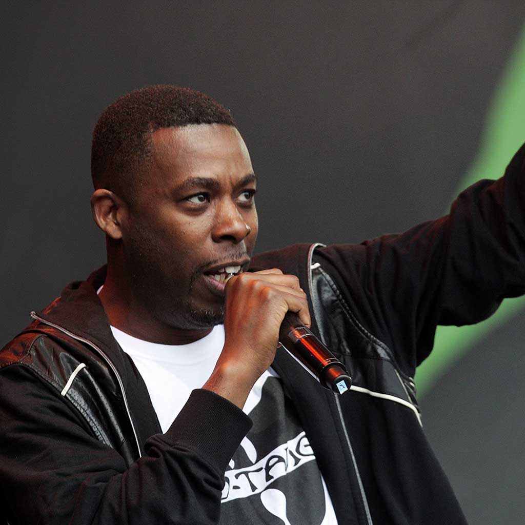 GZA rapping on stage - GZA in the 90s