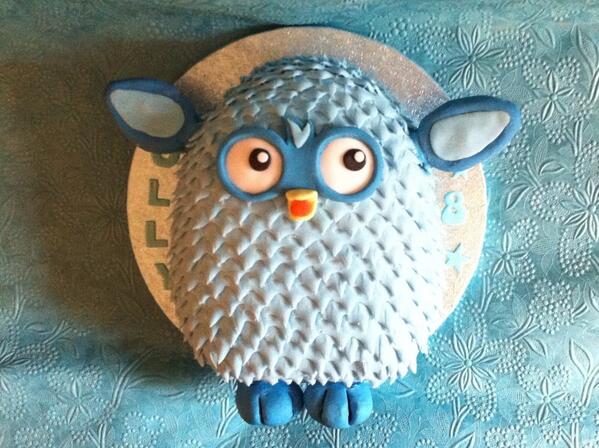 A furbies themed cake from the 1990s