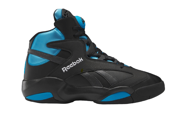 a picture of black shaq attack sneakers from the 90s