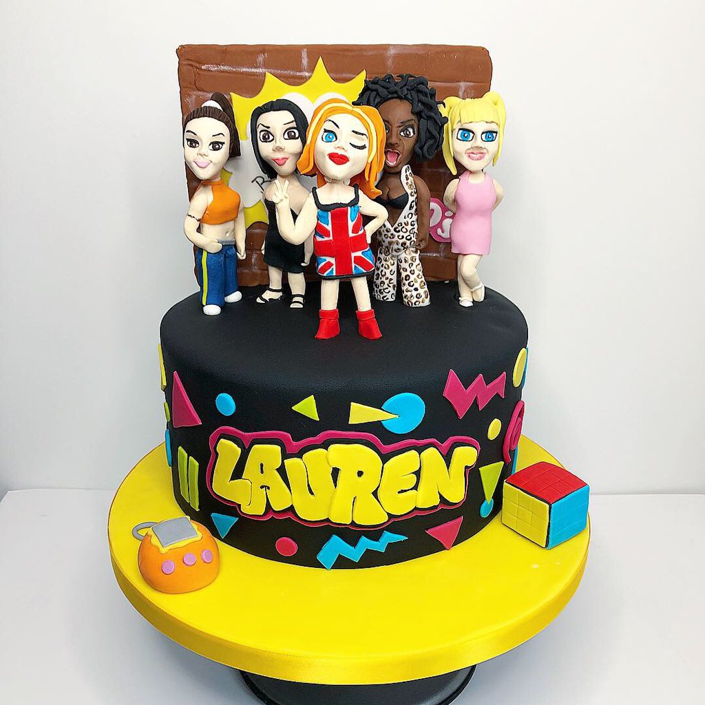 A cake showing the spice girls in the 1990s