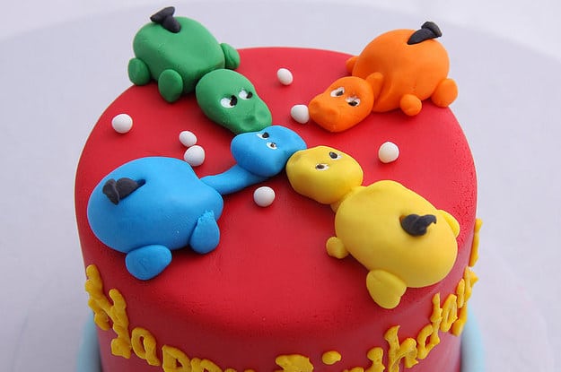 a cake of hungry hippos from the 90s