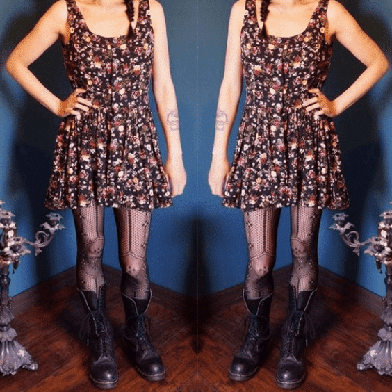 woman wearing 90s grunge floral dress paired with combat boots